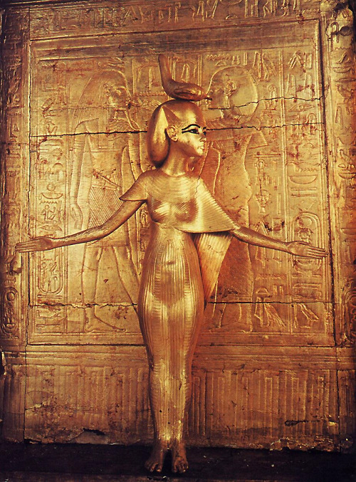 Serket protecting chest of canopic shrine, goddess of protection against disease and poison (gilded wood), from the Tomb of Tutankhamun. New Kingdom, 18th Dynasty, ca.1332-1323 BC. Now in the Egyptian Museum, Cairo.
