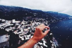 jayalvarrez:  Italy playing on the cliff side by jayalvarrez