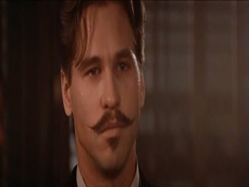 thatdamnspartan-deactivated2016:  Val Kilmer as John “Doc” Henry Holliday in “Tombstone” (1993) 