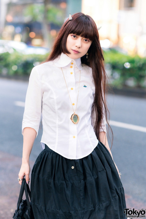 tokyo-fashion:  Married Japanese couple Kazuki and Saki - known in the Tokyo fashion scene for their shared love of Vivienne Westwood - on the street in Harajuku wearing looks by Vivienne and World’s End with jeweled devil horns, rocking horse shoes,