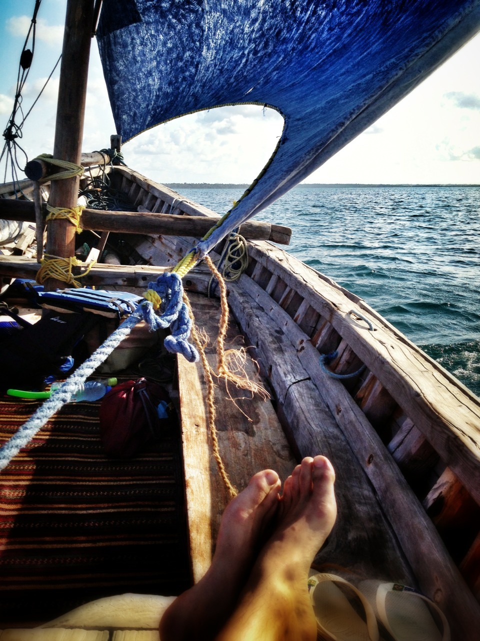 ari-in-africa:  Sailing in a dhow at sunset after snorkeling off Mafia island, Tanzania.