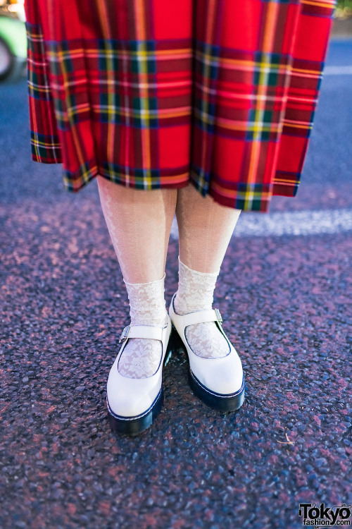 Akari on the street in Harajuku wearing a red plaid outfit by Japanese fashion brand HEIHEI with a f