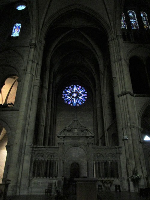 The Basilica of Saint-Remi, Reims, with most of the lights off on a rainy day.  Not great for taking