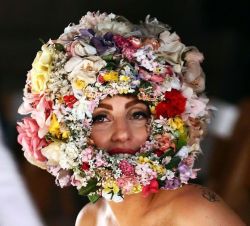 zsresearchfile:  Lady Gaga in Philip Treacy floral headpiece at London Fashion Week 2012. 