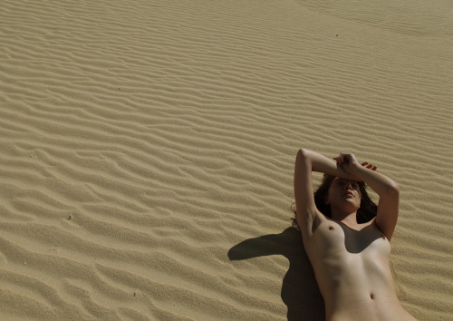 rebeccadimovski:  Enigma. I’ve started noticing two opposites attracting in my works as of recent. The delicate yet graciously constricted female form dancing with how simple and untouched our sacred land is. What i’m essentially doing is forming