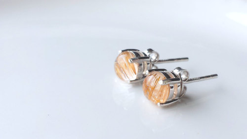 Sterling Silver Golden Rutile Quartz Stud Earrings
Use coupon code FBFRIENDNOV15 at checkout to claim 10% off your total purchase until 30th November 2015.
These 925 Sterling Silver stud earrings are made with genuine Golden Rutile Quartz gemstones....