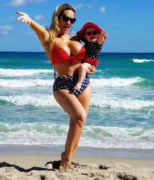 Coco Austin takes a dip as she enjoys watery playtime with baby