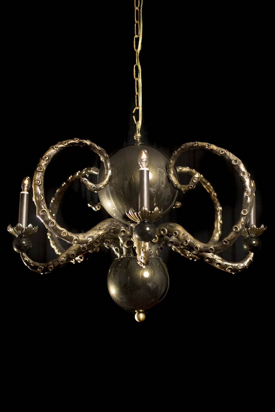 lady-grae:  staceythinx:  Octopus chandeliers by Adam Wallacavage  I think I need