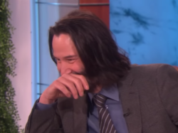 pajamasecrets:  there’s the famous keanu mouth-cover-giggle!!! how can a 54 year old man be this ADORABLE