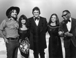 rootsnbluesfestival:  Johnny Cash invites friends Waylon Jennings (left), Jessi Colter, wife June Carter and Ray Charles to pose for a promotional portrait for his television special Johnny Cash: Spring Fever on April 14, 1978.