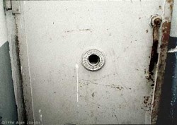 sixpenceee: THE JUDAS OPENING A peephole in the door of a gas chamber in which people could look in and watch the suffocating terror for those inside. (Mauthausen Chamber) SOURCE 