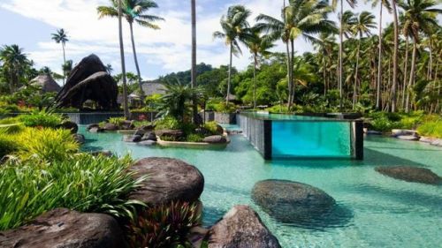 madness-is-my-life:sixpenceee:Located in Laucala, Fiji at the Laucala Island Resort, this pool looks