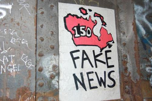 Montreal streets covered with anti-colonial, anti-nationalistposters for the Canada 150 celebrations