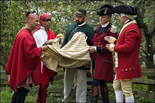 Re-enactment of Captain Simeon Ecuyer giving Native Americans smallpox infested blankets during a pa