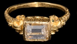 archaicwonder:  Rare Renaissance Gold and Type IIA Diamond Ring, 16th-17th Century AD A slender D-section gold hoop with graduated rosettes to the shoulders, scrolls supporting a cupped bezel with egg-and-dart modeling to the rim, open to the underside;
