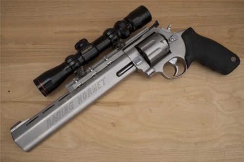 gunrunnerhell:  Taurus Raging Hornet A large revolver using the Raging Bull frame, the Raging Hornet is of course chambered in.22 Hornet. It was only available with a 10” barrel. These are fairly uncommon since Taurus only had them in production for