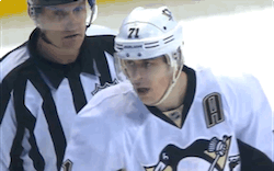 so-hockey-eh:  Ragebear Geno and the ref swooping in to skate him away.