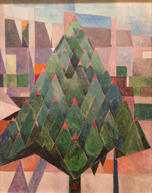A Stained-Glass Tree
Theo van Doesburg, Tree (L’arbre-maisons), 1916, oil on panel, 26 x 22 in.
Portland Art Museum
Dutch modernist Theo van Doesburg is best known for being a founder of De Stijl (Dutch for “The Style”), an artistic style and...