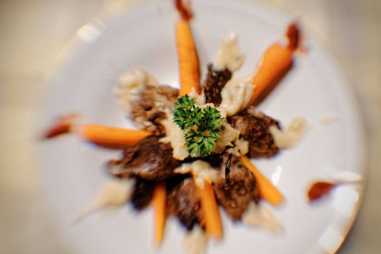 Rabbit&rsquo;s liver in mushroom sauce with baby carrots.