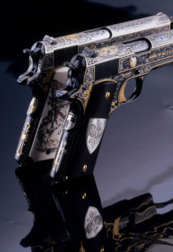 steampunktendencies:  “The White &amp; Black Knights” 1911 A1 .45 Autos  by Mike Dubber Engraving Studio