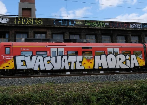 Train graffiti in Hannover, Germany calling for the evacuation of the thousands of refugees stranded