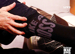 thewalkinggifs:  Norman Reedus showing off his socks on Talking Dead (*by request)