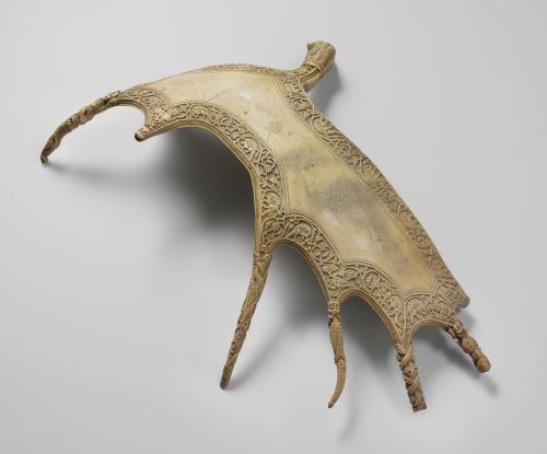 thegreenwolf:Ornamental shield made from an elk’s* antler, c. 1000 - c. 1199. Source.[Lupa’s note: I