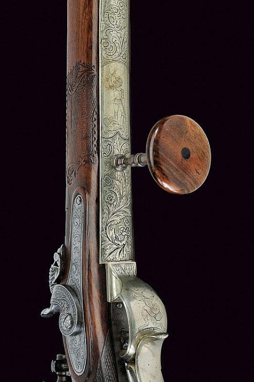 A silver mounted percussion target rifle originating from Switzerland, circa 1827.