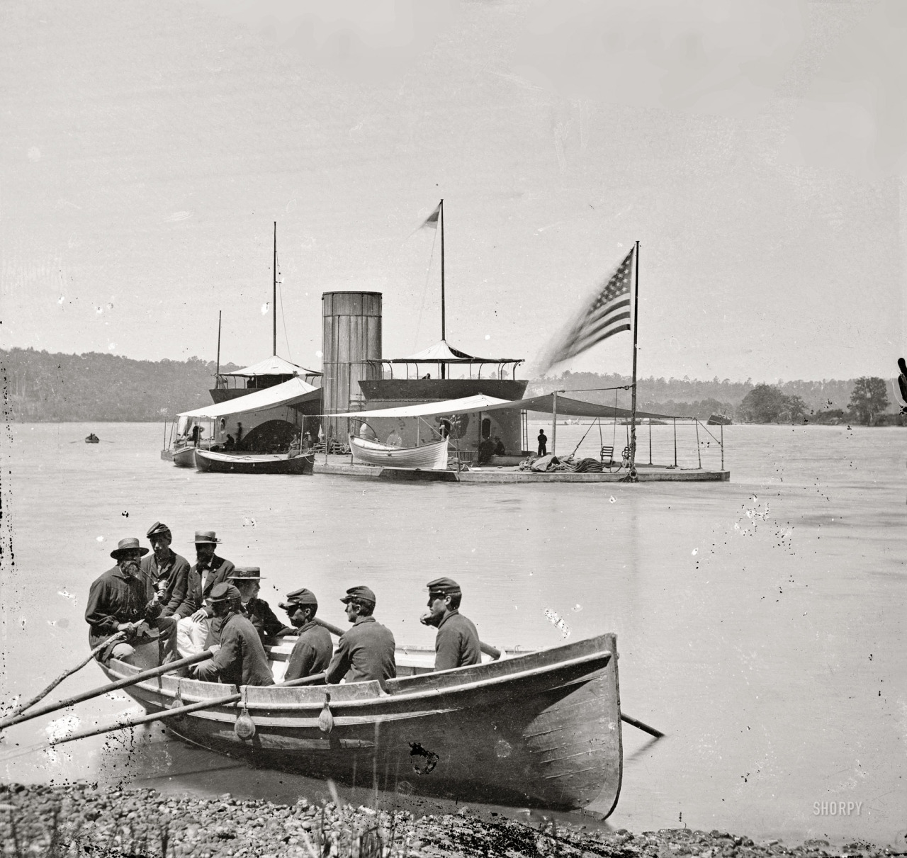 1864. &ldquo;James River, Virginia. Monitor U.S.S. Onondaga; soldiers in rowboat.