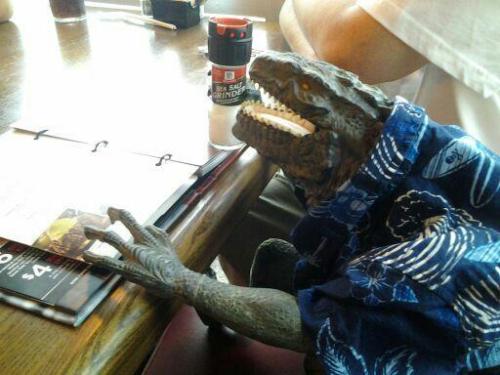 lennythereviewer:  darkriku5:  My friend was walking and found this Godzilla toy in the Trash so he put a shirt on it, named him John, and then took him out to T.G.I. Fridays and then Dinner was on John.   Godzilla is such a bro 