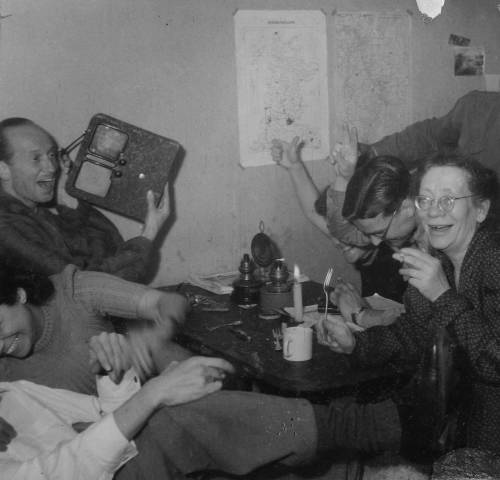 unsubconscious:Dutch resistance members celebrate at the moment they heard of Adolf Hitler’s death o