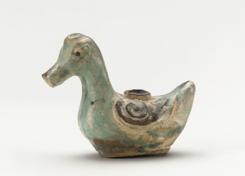 Zhangzhou ware water container in the form of a duck16th centuryMing dynasty Porcelain with iron pig