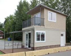 tinyhousedarling:  Eagle Microhome  The Eagle Microhome: is a 350 sq. ft., two floors with a 50 sq. ft. deck on top. The main floor is 10′ x 20′, with a 5′x5′ bathroom (shower, toilet, sink) and two cabinets and small window, living area has french