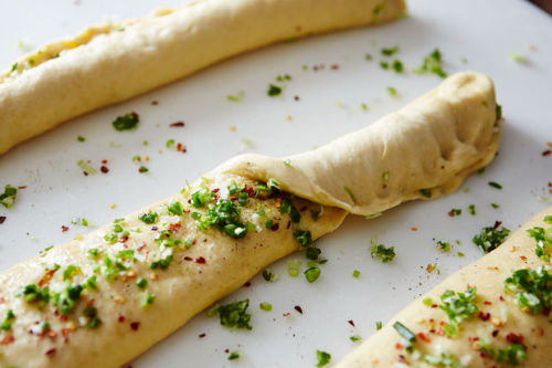 XXX food52:A scallion pancake and a loaf of challah photo