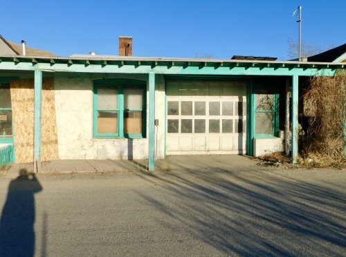 Self-Portrait WIth Abandoned Commercial Building, Tonopah, Nevada, 2020.