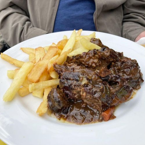 Wild boar in wine sauce with vegetables, served with French fries.  Arachova GR  @oistrosbyaktida  &