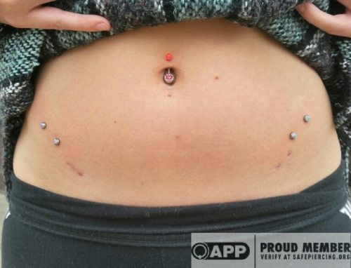 Noel fixed this client up with some surface piercings done right! 