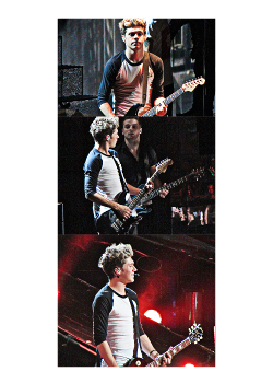 ofziall:   Little cutie Niall playing guitar to thousands - 25/10  