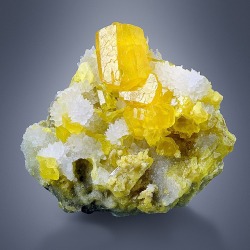 hematitehearts:  Sulfur with AragoniteLocality: Cianciana mine, Agrigento, Sicily, ItalySize: 4.3 × 4.7 × 3.6 cm