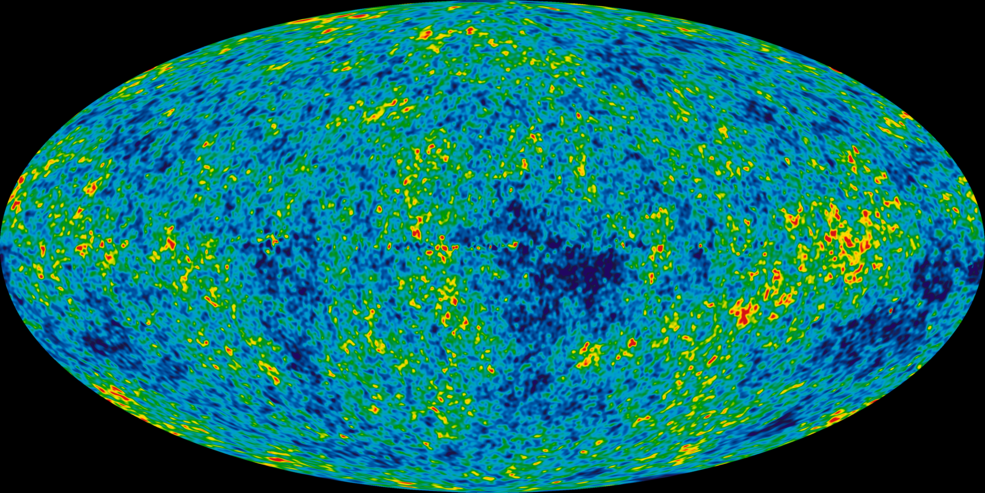 This image shows the oldest light in the universe, the cosmic microwave background, captured by the Wilkinson Microwave Anisotropy Probe, also known as WMAP. At the center of the image is a colorful oval that is speckled with the seeds of galaxies, which appear as blobs of dark blue, light blue, green, yellow, and a little bit of red.