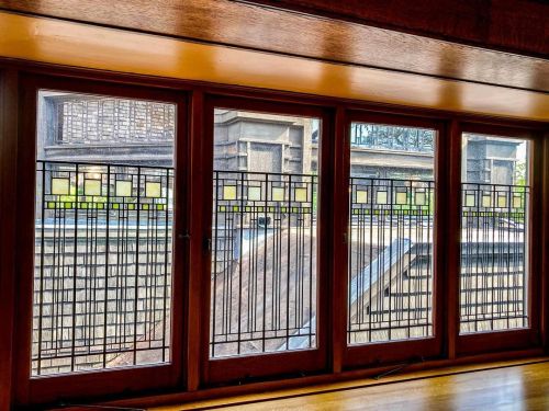 View through the tulips to the Drafting Room balcony. A view that is mentioned in a funny story in J