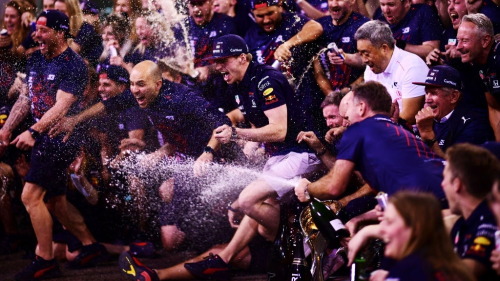 2021 F1 World Drivers Champion Max Verstappen Celebrates With His Team After The F1 Grand Prix Of Abu