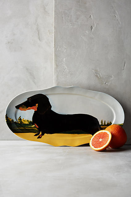 This serving platter with a stately black-and-tan will elevate your living space. By Sally Muir, at 