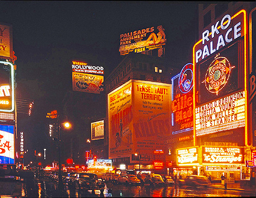 :  Rainy night in Times Square, New York. Photographed by Walter Berk. (1947) 