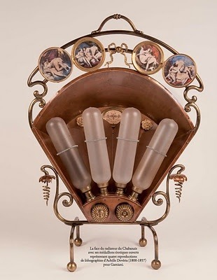 A varnished brass radiator from the Parisian brothel Le Chabanais with erotic imagery. Late 19th, ea