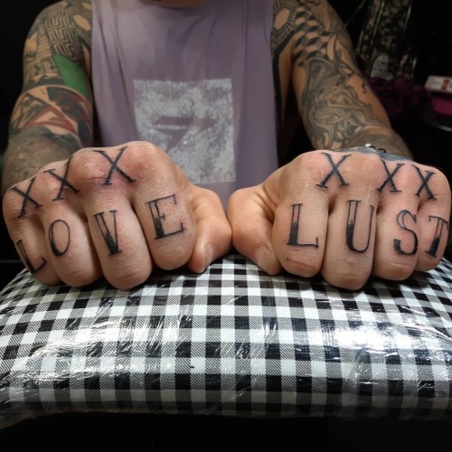 Knocked out these #rad #knuckles #lettering #lust #love #tattoos last week #tattoo by #femaletattooa