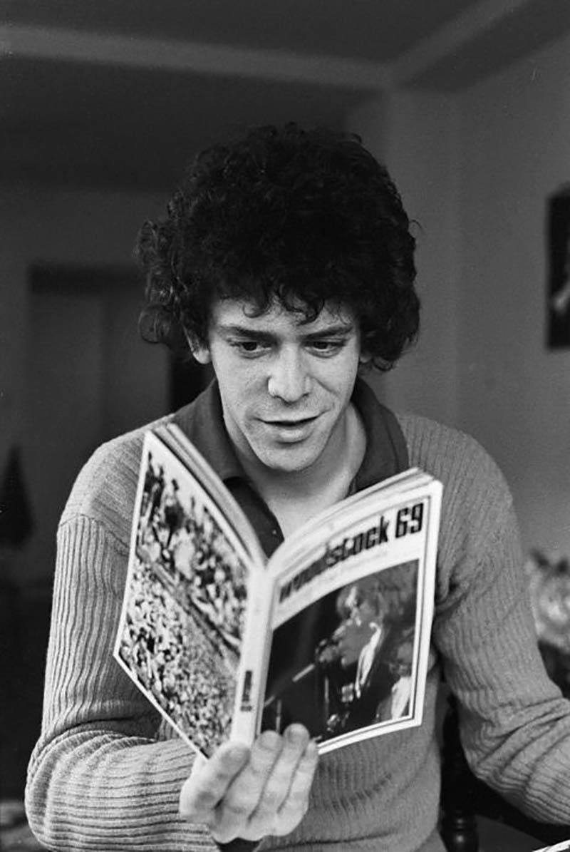 soundsof71:Lou Reed, reading up on Woodstock, 1970, by Joe Sia.