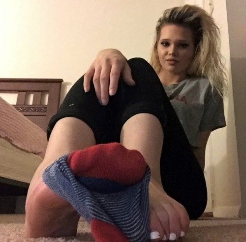 jennsummers50: Kelly strips off her new Converse sneakers and multicolored socks to show us her smal