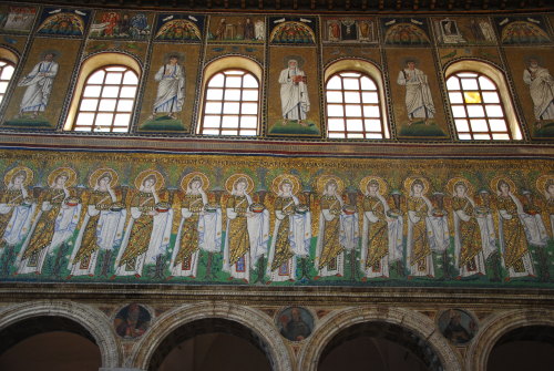 The spectacular interior of the Basilica of Saint Apollinare Nuovo, in Ravenna, Italy.  The mosaics 