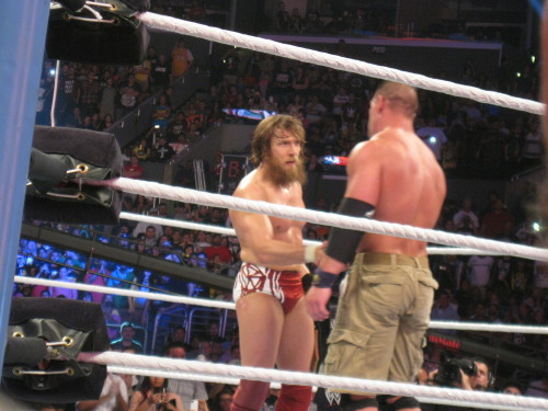 serenitywinchester:  John Cena vs. Daniel Bryan for the WWE championship at Summerslam 2013.  John Cena’s ass + sweaty Daniel Bryan = YES Please!